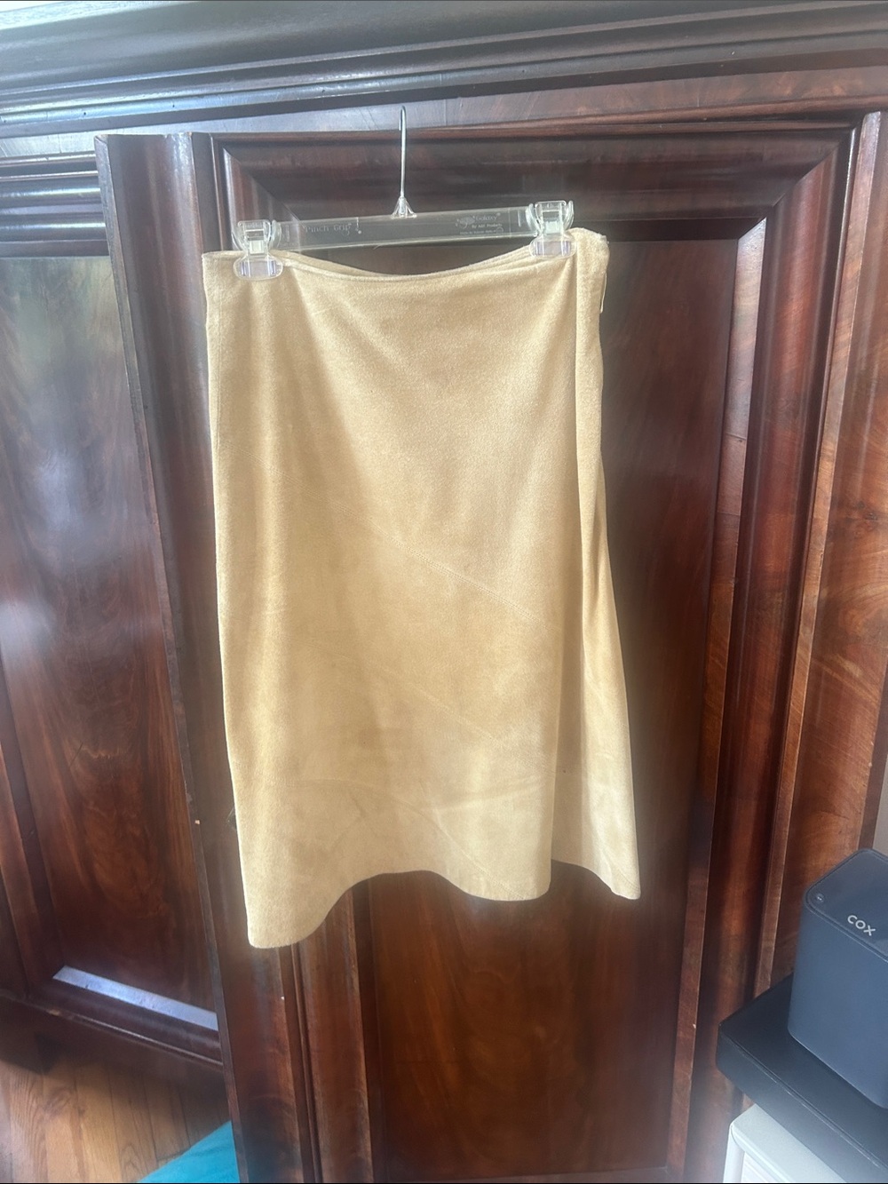 Beige Suede knee length skirt.